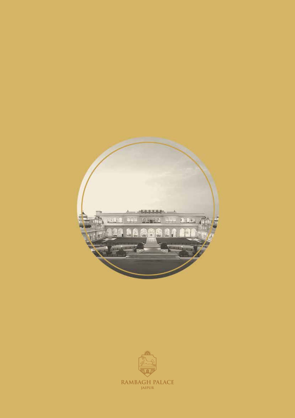 The menu cover — a duotone palace in a gold roundel on a gold field, with the Rambagh Palace crest